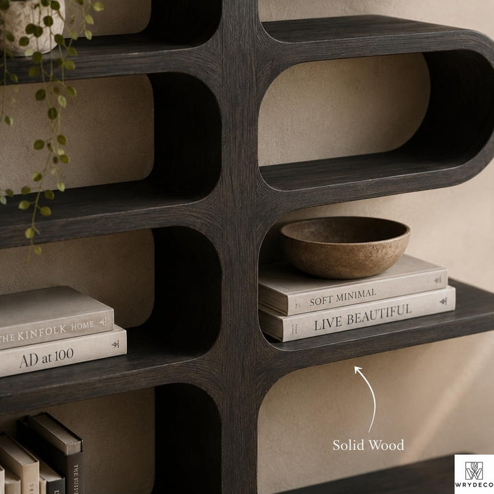 Solid Wood Sculptural Bookshelf for Home or Office - View 3. Sculptural Curved Storage A statement solid wood bookshelf that combines open storage with a flowing curved silhouette, bringing warmth, artistic character, and practical display space into modern interiors. 01 Sculptural Curved Design The flowing curved silhouette blends functional shelving with an artistic form, creating a modern focal point while providing open display space for books, plants, décor, and everyday objects. 02 Solid Wood Craft...