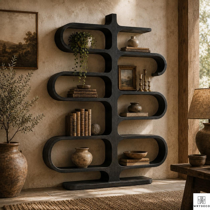 Solid Wood Sculptural Bookshelf for Home or Office - View 1. Sculptural Curved Storage A statement solid wood bookshelf that combines open storage with a flowing curved silhouette, bringing warmth, artistic character, and practical display space into modern interiors. 01 Sculptural Curved Design The flowing curved silhouette blends functional shelving with an artistic form, creating a modern focal point while providing open display space for books, plants, décor, and everyday objects. 02 Solid Wood Craft...